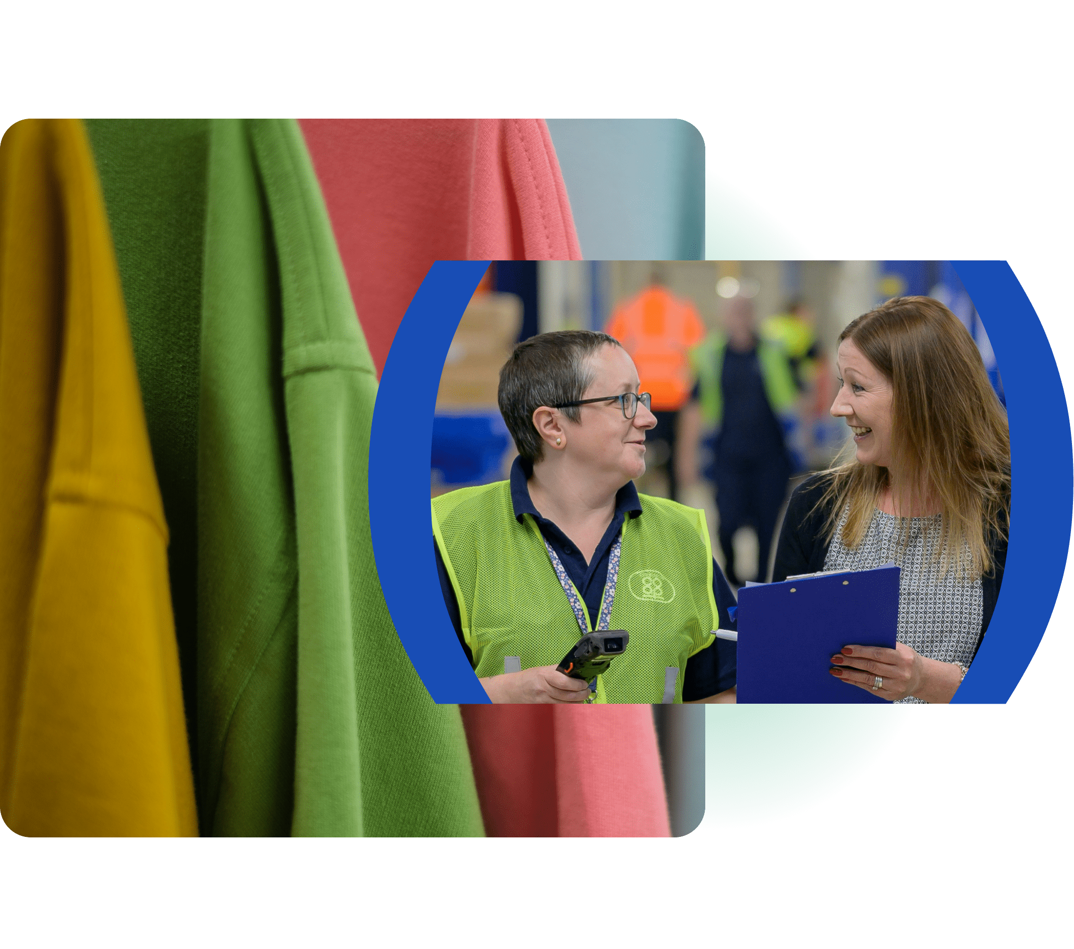 Warehouse inventory specialists talking near colorful hanging blank apparel.